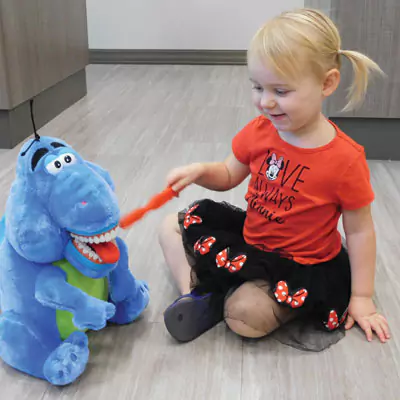 Midland Patient Learning About Dental Health